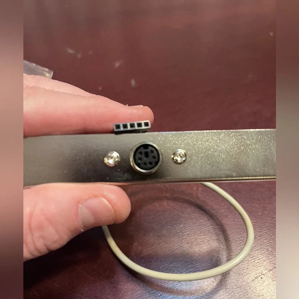 Misc computer slot connections and screws.